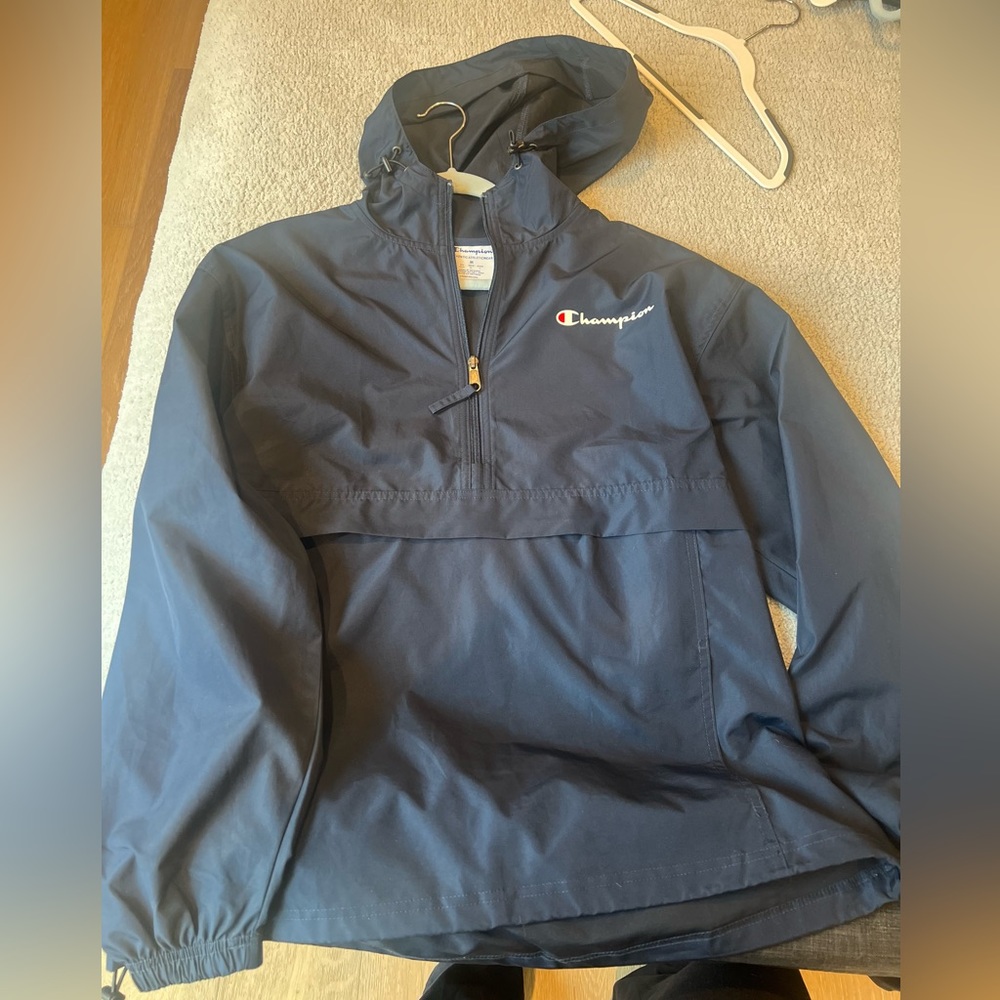 Navy blue champion rain jacket. Quarter Zip